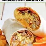 Homemade Sonic ultimate meat and cheese breakfast burrito and tater tots on a plate.