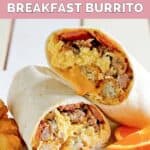 Homemade Sonic ultimate breakfast burrito, orange slices, and tater tots.