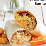 Homemade Sonic ultimate breakfast burrito cut in half.