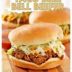 Homemade Taco Bell Bell Beefer sandwich on a wood board.