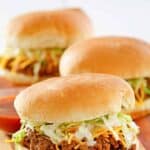 Three homemade Taco Bell bell beefer sandwiches.
