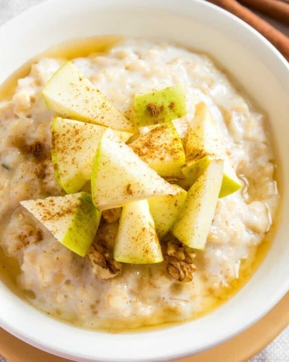 A bowl of slow cooker apple cinnamon oatmeal.