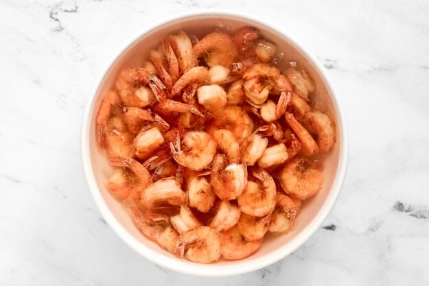 Freshly boiled shrimp in ice water.