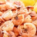 A pile of boiled shrimp with shells.