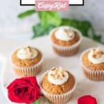 Four carrot cake cupcakes.