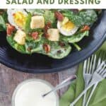 Homemade Commander's Place salad and a small bowl of the dressing.
