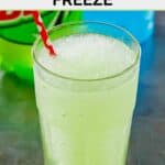 Copycat Taco Bell baja blast freeze drink with a straw in it on a table.