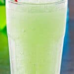 Copycat Taco Bell baja blast freeze drink in a tall glass.