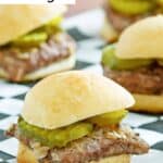 Homemade white castle burgers on parchment paper.