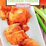 Homemade Wingstop Buffalo chicken thighs on a long platter.