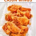 Homemade Wingstop Cajun wings in a parchment paper lined basket.