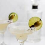 Homemade Applebee's perfect margarita garnished with lime and olives.