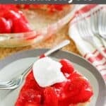Homemade big boy strawberry pie slice and a fork on a plate.