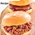 Homemade Buc-ee's brisket sandwiches on a wood board.