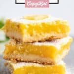 Homemade classic lemon bars in a stack.