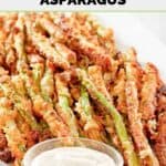 Homemade Longhorn Steakhouse parmesan crusted asparagus with dipping sauce.