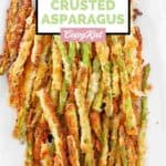 Homemade Longhorn parmesan crusted asparagus on a rectangular platter.