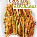 Homemade Longhorn parmesan crusted asparagus on a platter.