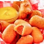 Homemade mini corn dogs on parchment paper.