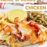 Copycat Outback Steakhouse Alice Springs chicken on a plate with green beans and fries.
