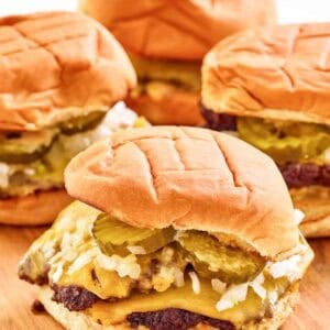 Copycat double sonic smasher burger on a wood surface.