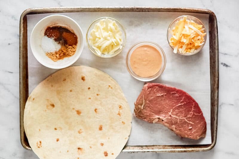 Copycat Taco Bell steak quesadilla ingredients on a tray.