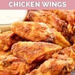 Homemade Wingstop Louisiana rub wings piled on a plate.