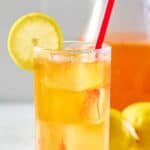 A glass of copycat Chick-fil-A sunjoy garnished with lemon.