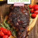 Oven baked Indian style kashmiri lamb leg, rosemary, and tomatoes.