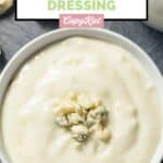 Homemade Simon and Seafort's blue cheese dressing with blue cheese crumbles on top.