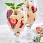 Copycat La Madeleine strawberries romanoff in wine glasses.