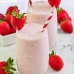 Homemade strawberry julius and fresh strawberries.