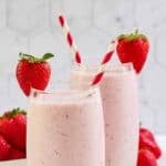 Two glasses of homemade strawberry julius.