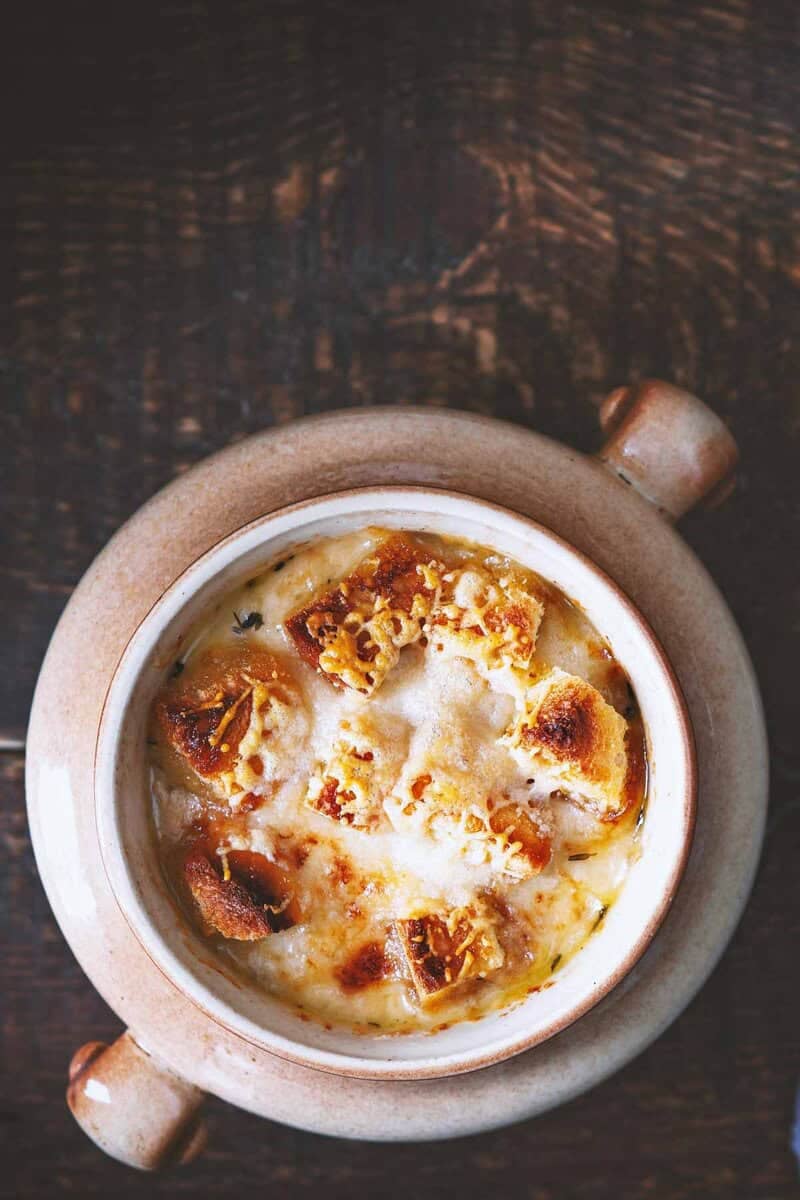 Copycat Brown Derby French onion soup in a soup crock.