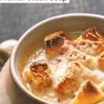 Homemade Brown Derby French onion soup in a bowl.