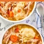 Two bowls of old-fashioned southern homemade chicken and dumplings.