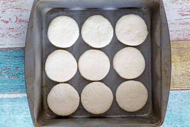 Copycat Cracker Barrel biscuits in a pan before baking.