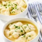 Two bowls of homemade cracker barrel dumplings.