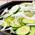 Cucumber onion salad on a plate.