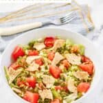 Homemade green jacket salad and dressing in a bowl.