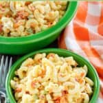 Homemade macaroni salad in bowls.