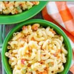 Classic homemade macaroni salad in a small bowl.