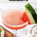 Homemade Olive Garden watermelon margarita garnished with a watermelon slice.