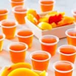 Homemade peach jello shots and peach slices.