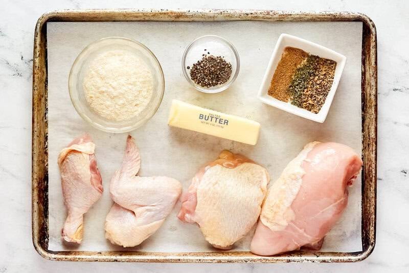 Instant mashed potato flakes, seasonings, butter, and cut up chicken pieces to make oven baked chicken coated with instant masted potato flakes 