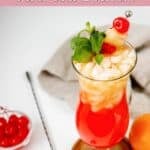 Homemade Red Lobster mai tai garnished with cherry, pineapple, and mint.
