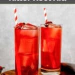 Two copycat Ruby Tuesday killer kool aid drinks on a round wood board.