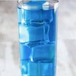 Homemade Sonic ocean water drink in a tall glass.