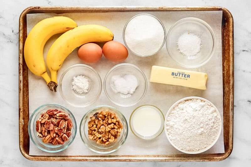 Copycat Starbucks banana walnut and pecan bread loaf ingredients on a tray.