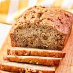 Homemade Starbucks banana nut bread on a wood cutting board.